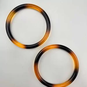 Håndtak plastikk svart-rav 11cm diameter